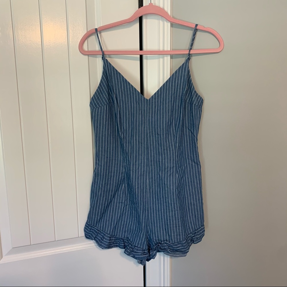 Striped romper with tie back and ruffle hem - no size listed but fits like a M